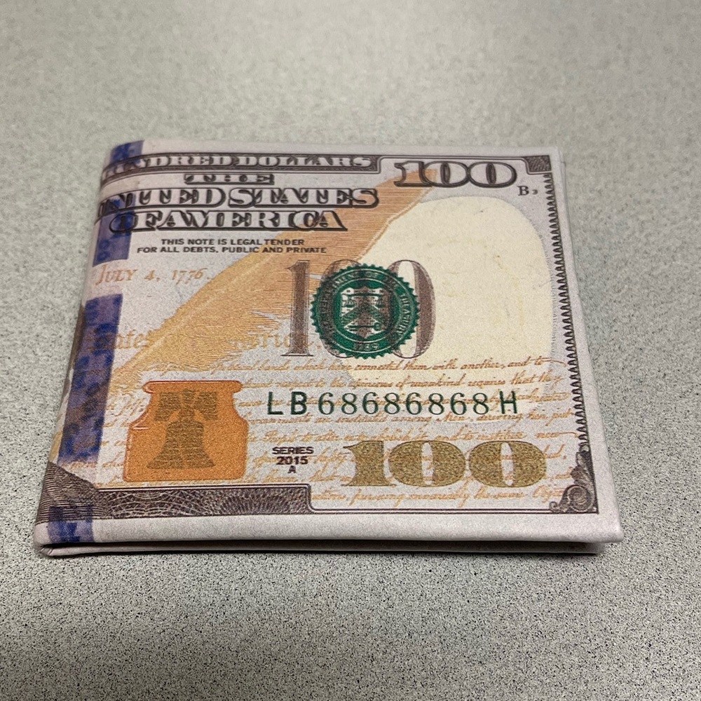 Gently USED wallet / multi pockets / tear-proof, waterproof & recyclable